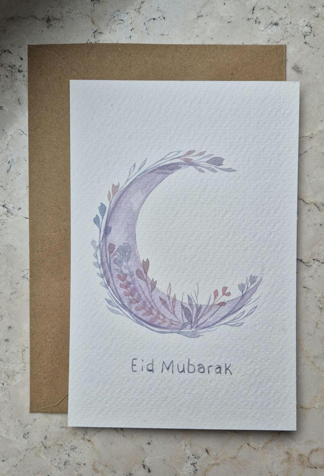 Handgemalte Eid Mubarak Karte mit Mond- und Blumen-Aquarell-Design