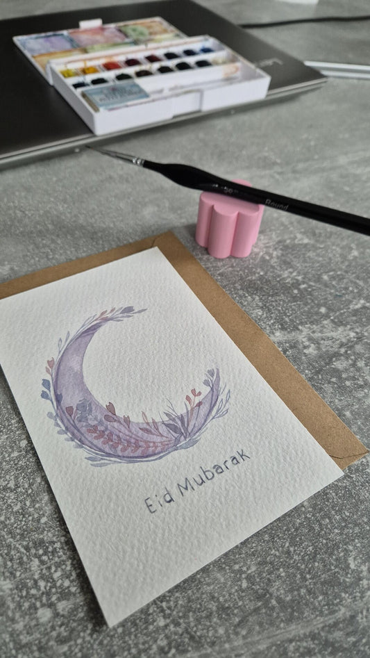 Handgemalte Eid Mubarak Karte mit Mond- und Blumen-Aquarell-Design